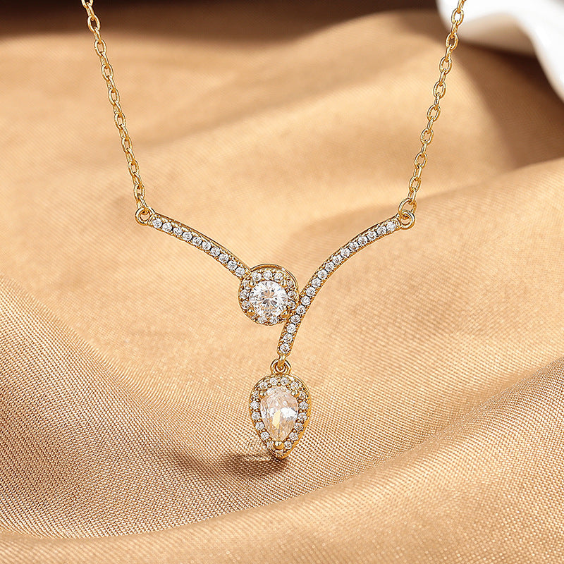 Elegant V-Shaped Water Drop Necklace – Sparkling Micro-Inlaid Zircon Design.