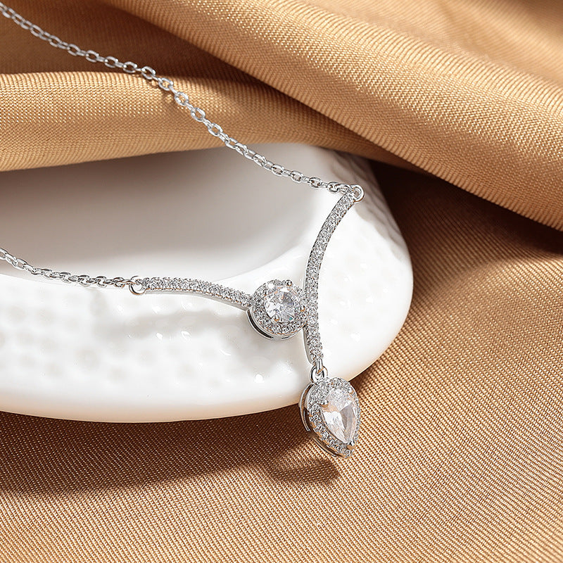 Elegant V-Shaped Water Drop Necklace – Sparkling Micro-Inlaid Zircon Design.